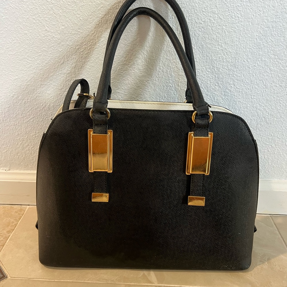 Elegant Black Handbag with Gold Accents